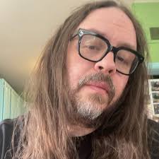 Arnold Schoenberg having a miserable time with his miserable family. Happy  Birthday, Arnold Schoenberg!