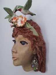 Humming bird, box elder for the base the flower is beech and the humming  bird is sycamore made in a stormy Blairgowrie