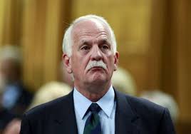 Public Safety Minister 'Ezra Toews' relies