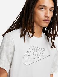 Give just a hint of color by adding a contrast color to your existing hair color, like this pink and blonde look. Nike Sportswear Futura Club Camo Print T Shirt
