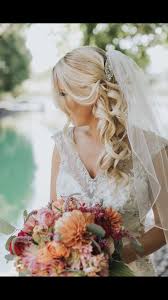 Side Swept Bridal Hair Do Broach Clip Blonde Curlysidesweep Halfup Pinks Flowers Veil Wedding Bride Bridal Hair Wedding Hair Side Wedding Hairstyles