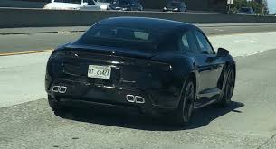 The concept version of the taycan, named the porsche mission e, debuted at the 2015 frankfurt motor show. Porsche Taycan Looks Surprisingly Small On U S Highway Carscoops