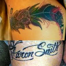 Super Hard Upper Thigh 1st Last Name Cover Up Feather Tattoo Done By Scott Aka Tattoo Artist Scooby At Southern C Charm Tattoo Tattoo Artists Feather Tattoo