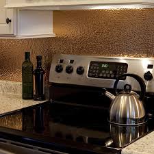 Copper backsplashes can easily fit most of cabinetry colors: 39 Trendy And Chic Copper Kitchen Backsplashes Digsdigs