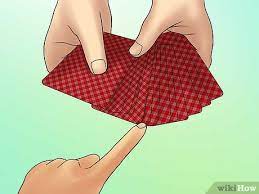 As he hovers his hand over the card, he pulls down the piece of cloth, revealing the card below. How To Do A Disappearing Card Trick 13 Steps With Pictures