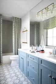Many years ago, picking a theme for your bathroom involved buying a few matching elements, like a shower curtain, bath rug, trash can, and soap dispenser that were part of a set. Bathroom Double Shower Curtain Ideas Design Corral