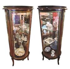 Fill it with books or. Rare Pair Of Wood And Glass Panelled Round Curio Cabinets Bronze Decorations Glass Shelves Bernardis Antiques