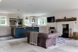 This modern kitchen has a central island with the sink the island serves the purpose of demarcating the living room from the dining space and adds function too. High Farm House Open Plan Living Kitchen Dining Transitional Games Room Wiltshire By Orange Key Design Studios Houzz Uk