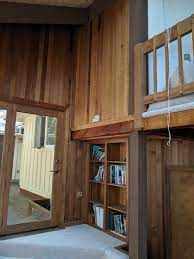The boards are fastened on the exterior with the batten strips covering the area where the two boards meet. What To Do About Rough Sawn Wood Paneling
