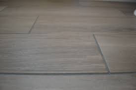 When Your Tile Grout Turns White This May Work Bathroom Progress Grey Wood Tile Grey Flooring Tile Grout