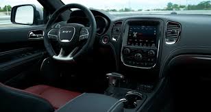 Great interior good choice of materials, complemented by soft nappa leather. Dodge Durango Vs Chevy Tahoe Three Row Suv Battle