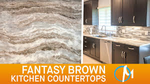 Amazing kitchen features gray cabinets painted benjamin moore galveston gray paired with fantasy brown granite countertops and a blue brick tiled backsplash, wizard brick. Fantasy Brown Kitchen Countertops Iii Marble Com Youtube