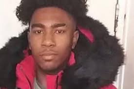 CCTV of moment Terrell Decosta Jones-Burton, 15, is 'tackled into doorway  of chicken shop', leaving him seriously injured