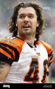 Cincinnati Bengals long snapper Clark Harris (46) talks with Chicago Bears  long snapper Patrick Mannelly (65) prior to an NFL football game, Sunday,  Oct. 25, 2009, in Cincinnati. (AP Photo/Ed Reinke Stock Photo