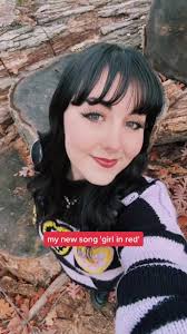 Blonde Girl in Red Dress Performing Song