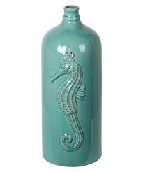 Tout l'art de la table en usage unique dans les tons turquoise (décoration et chemin de table, , bougies, vases et photophore, nappe et serviette en papier ou en imitation tissu, verre, assiette. Turquoise 15 5 In Seahorse Table Vase Everything Turquoise