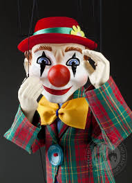 Clown (n.) 1560s, clowne, also cloyne, man of rustic or coarse manners, boor, peasant, a word of obscure origin; Der Clown Marionettes Cz