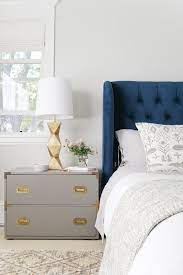 bedroom makeover on the blog today bedroom makeover gold bedroom blue headboard