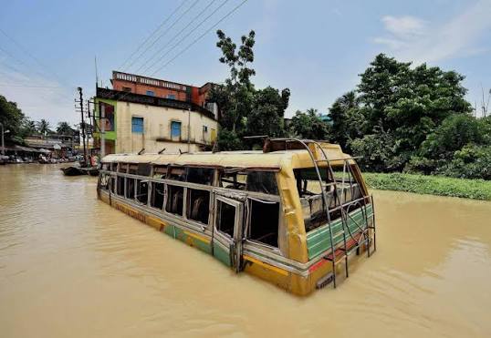 A bus submerged in flood waters at Ghatal in West Midnapore district of West Bengal on Sunday (PTI photo)