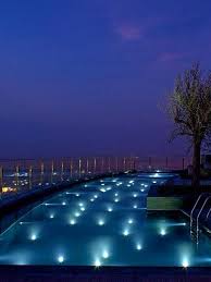 Night Swim In The Pool At Hyatt Capital Gate Abu Dhabi Photo Courtesy Of Lucapnfrtt On Instagram Night Swimming Swimming Swimming Pools