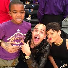 21 at barclays center in new york city. Rihanna And Chris Brown Cosy Up Court Side At Christmas Basketball Game Daily Mail Online