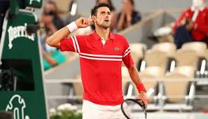 Novak djokovic shakes his head at lorenzo musetti's brilliance after another thrilling point. Aqpovf8yjxs Mm