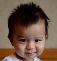 Bruce, pictured here in the dark shirt, sits with his martial arts students  in Seattle. He welcomed, and openly taught, students from all walks of life  no matter their race, age or