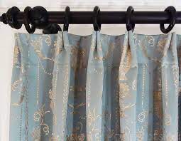 Hanging curtains can instantly add style and personality to your space — they are a key design element in almost every room of your house. How Do Drapery Rings Work Tips From A Workroom