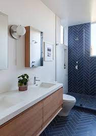 Dark blue bathroom floor tiles can be so different. 9 Bathroom Ceramic Tile Ideas For Your Walls Hunker Blue Bathroom Decor Bathroom Design Bathroom Floor Tiles