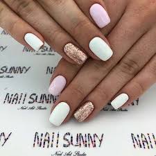 You can use both holographic glitters and chevron patterns in a single design to glam up the red and gold nail designs. 23 Best White And Gold Nails To Try Yourself Stayglam