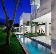 The Benefits Of Lap Pools And Their Distinctive Designs Pool Houses Lap Pools Backyard Lap Pool