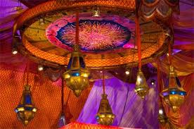 Moroccan Fabric Ceiling If Bold Colors Aren T For You Use Softer Tones And Simple Lanterns For A Light Atmospher Moroccan Tent Moroccan Nights Fabric Ceiling