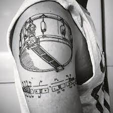 Mens dark music metallic drum tattoo on bicep. Top 67 Drum Tattoo Ideas 2021 Inspiration Guide