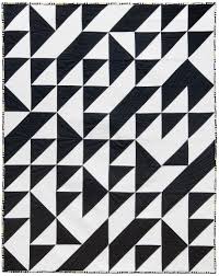 Black And White Square Pattern Fabric Turning Triangles Pattern Black And White Quilts Quilts Triangle Quilt