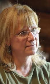 A throwback school in a log cabin, complete with Bible study