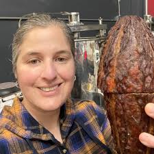 Chocolate maker Laura Withers hand-sorts cacao beans to remove any debris  or rocks or imperfect beans before the beans are roasted. This process  ensures that only the best cacao beans are used