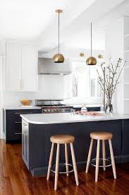 White And Navy Blue Kitchen With Caramel Colored Leather Counter Stools Transitional Kitchen Classic Kitchen Design Modern Kitchen Design Modern Kitchen