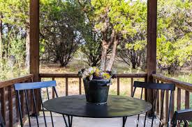 Yellow metal bucket style pot cover with bright white felt daisy accent. Fall Porch Decor Simple Ideas Maison De Pax