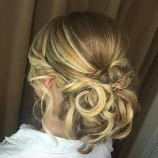 A tousled updo might not suit a strong trouser suit but it would suit a floaty floral dress. 20 Lovely Wedding Guest Hairstyles
