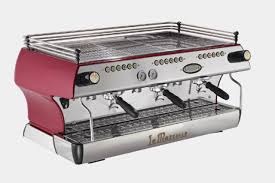 A grinder that simplifies and streamlines preparing espresso, making it possible to grind, dose and tamp a double espresso on demand with no waste and no mess. History La Marzocco