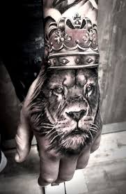 50 Eye Catching Lion Tattoos That Ll Make You Want To Get Inked Tattoos Eyecatching Inked Lion Ta Lion Hand Tattoo Hand Tattoos For Guys Hand Tattoos