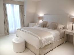Restful shared bedroom features beige stripe french twin beds dressed in white shabby chic bedding and topped on either side of a single white bone inlay nightstand, styled and positioned under stacked gold framed art hung from an. White And Beige Bedroom Ideas Clic Taupe Atmosphere Bathrooms Red Grey Wood Rooms Blue Tan Design Apppie Org