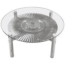 This jet engine component connects combustors in a turbine, mixing air with the fuel as it enters the combustion chamber, controlling the fuel burning process. Rolls Royce Jet Engine Impeller Low Table From England Aviation Furniture Low Tables Table