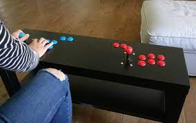 I built a simple table out of some wood from ikea furniture i was about to toss. Working Arcade Coffee Table