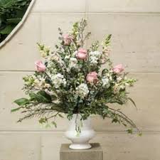 Renting a special altar for your wedding can add a unique touch and personality to your ceremony, especially when it is decorated with flowers by your florist. Wedding Flower Arrangements Ceremony Reception Little Chapel