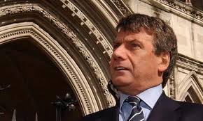 Arrested ex-News of the World executive Neil Wallis worked for Met