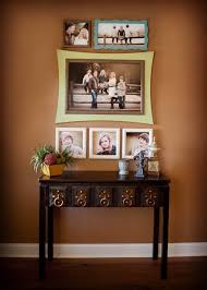 How to hang pictures in your home s hallway. How To Arrange A Photo Wall Tips And Creative Ideas