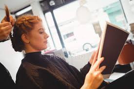 We did not find results for: Close Up Of Woman In Hair Salon Reading Attractive Stock Photo 225319834
