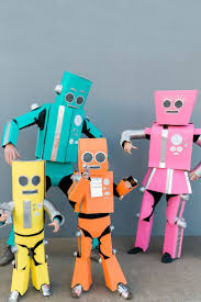 And they're way easy to make, as you can see from the following ideas we've gathered up for you. Diy Robot Family Costume Tell Love And Party Family Halloween Costumes Family Halloween Robot Halloween Costume