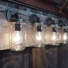 Looking for the perfect mason jar gift for a friend's light up the summer nights with these rustic and chic hanging mason jar lights. Amazon Com The Jarhead Mason Jar Rustic Pipe Fitting Vanity Wall Light Handmade